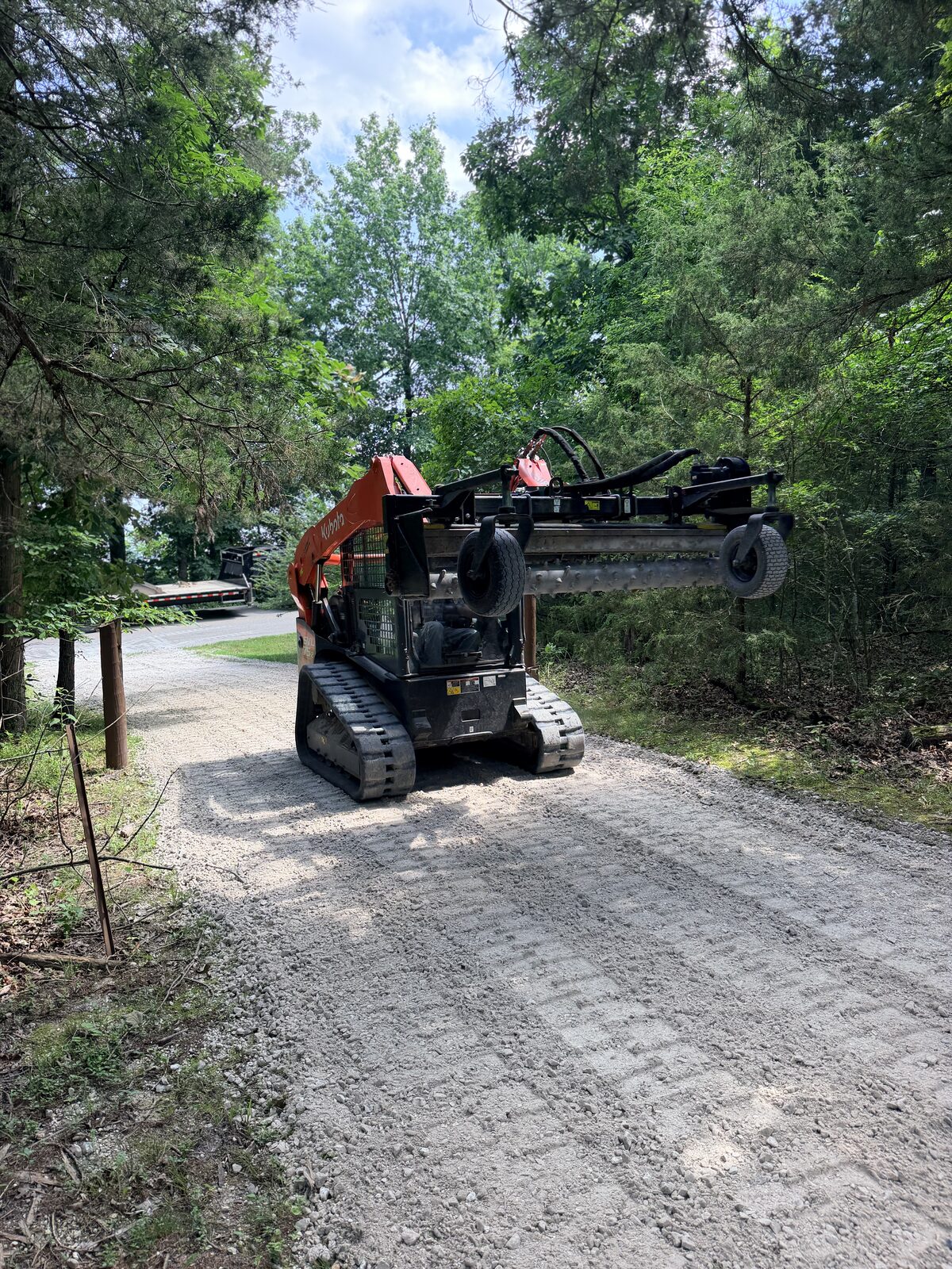 New gravel access road through the trees in Northwest Arkansas